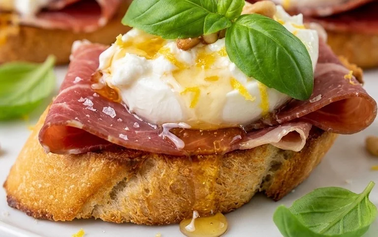 Beef Prosciutto Crostini with Burrata and Lemon Honey Drizzle